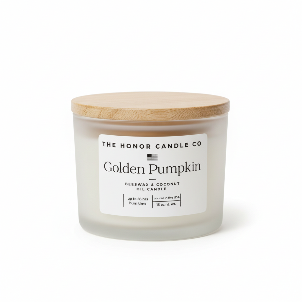 Golden Pumpkin candle by The Honor Candle Co, featuring a wooden lid and white label.
