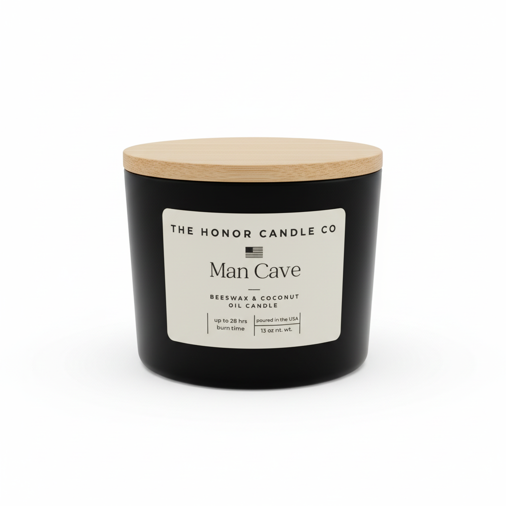 Black Man Cave beeswax and coconut oil candle by The Honor Candle Co with a wooden lid.