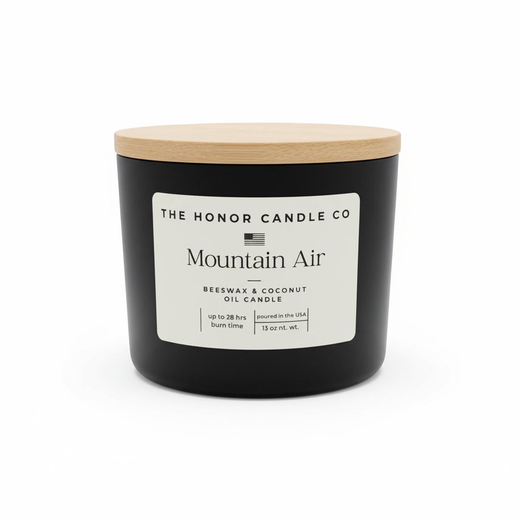 Black candle with wooden lid by The Honor Candle Co, featuring a label with text.